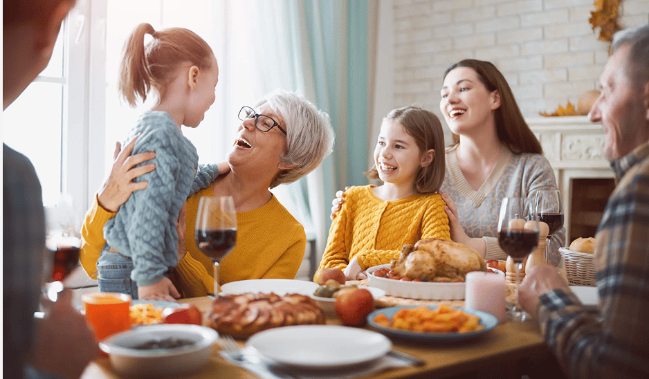 Family around dinner table