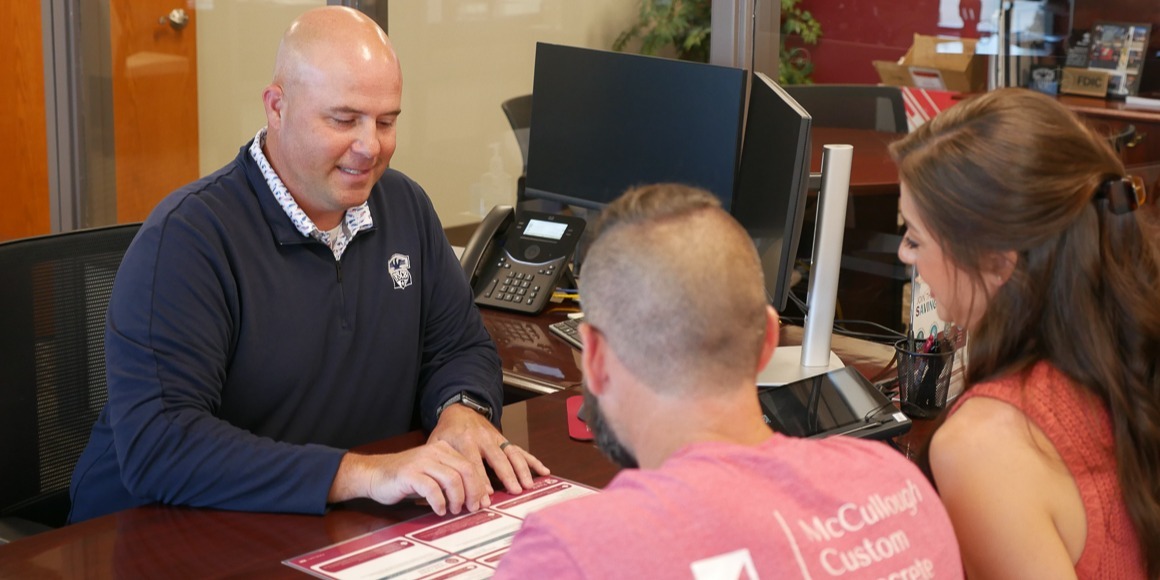 The Lowdown on Loans loan office with couple