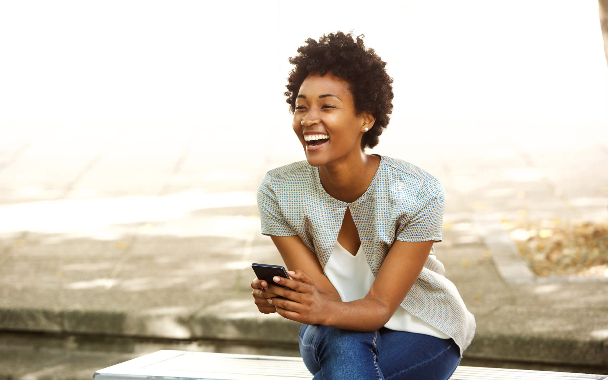 Women on her phone financial planning